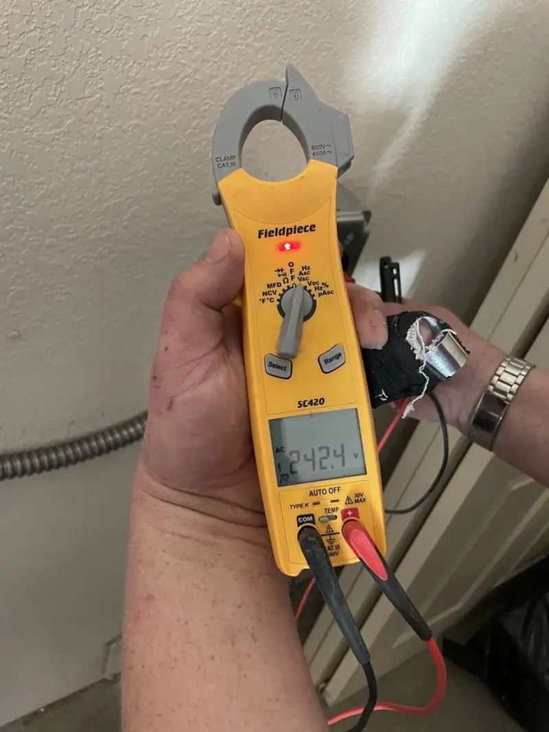 Voltage testing with clamp meter during Hot Tub / Pool Electrical Wiring in Hamilton